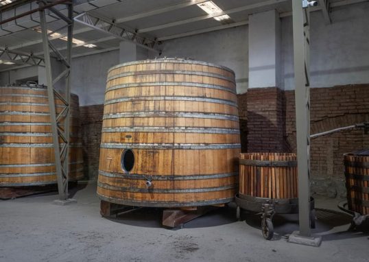 Interior view of wooden barrels used for wine fermentation in a Santiago, Chile winery.